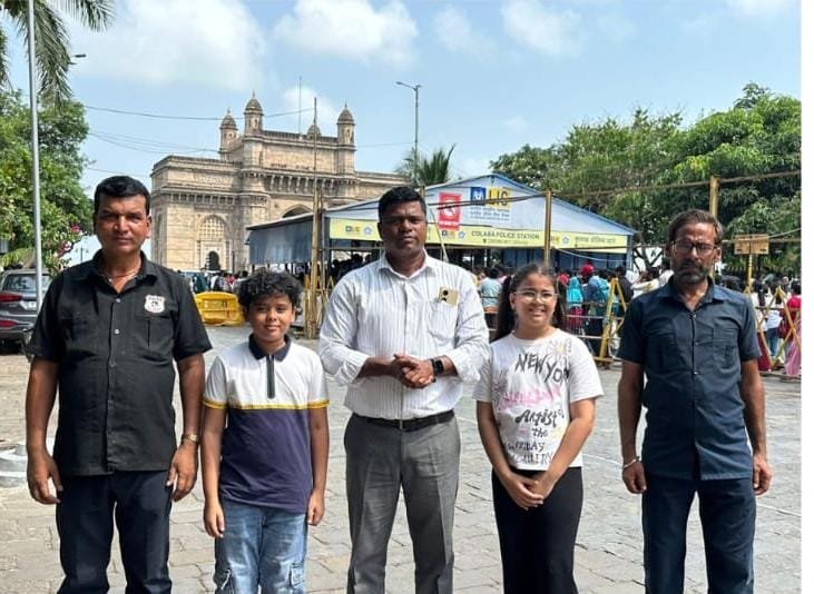 Group with Gateway of India in the background